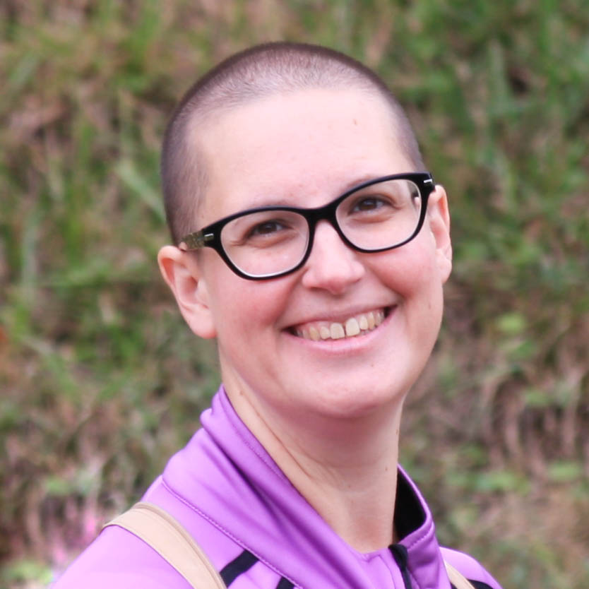 Carolyn Koncal Breinich childhood cancer survivor sports short hair and smiles