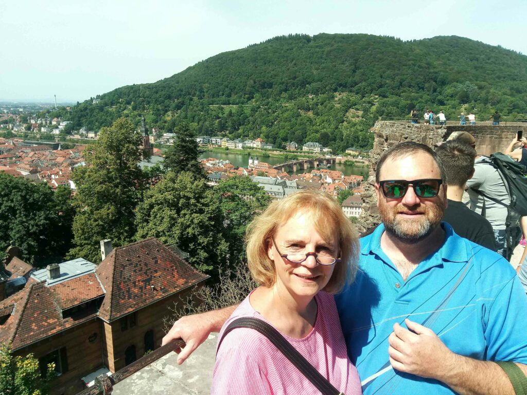 Al Drinkwalter, a melanoma survivor, smiles with his wife in Heidelberg, Germany.